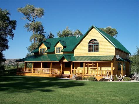 houses with dark green metal roofs|farmhouse with green metal roof.